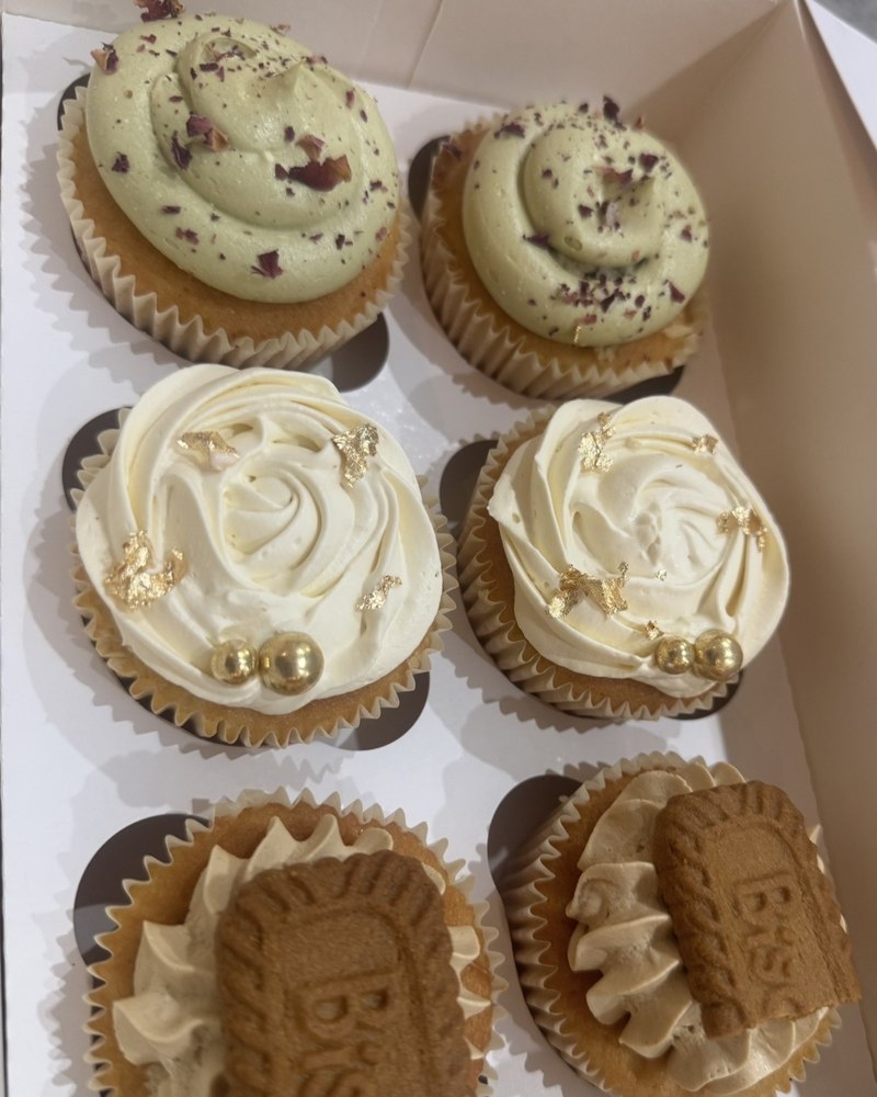 Assorted cupcakes with pistachio rose, gold leaf vanilla and Biscoff toppings