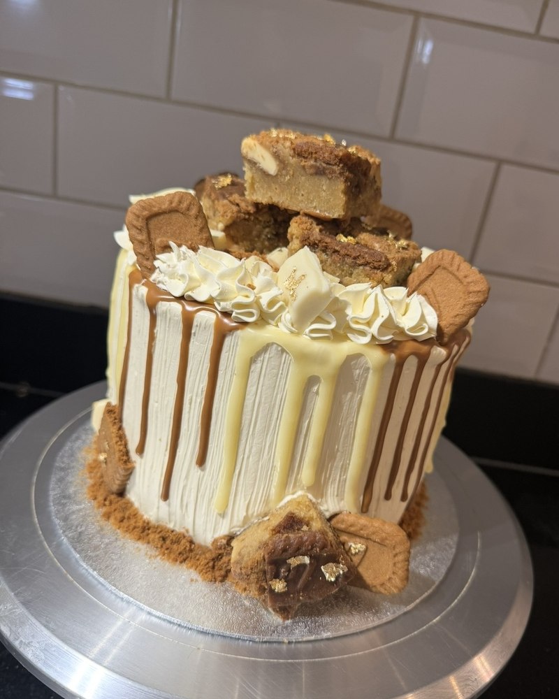 Biscoff drip cake with blondie pieces