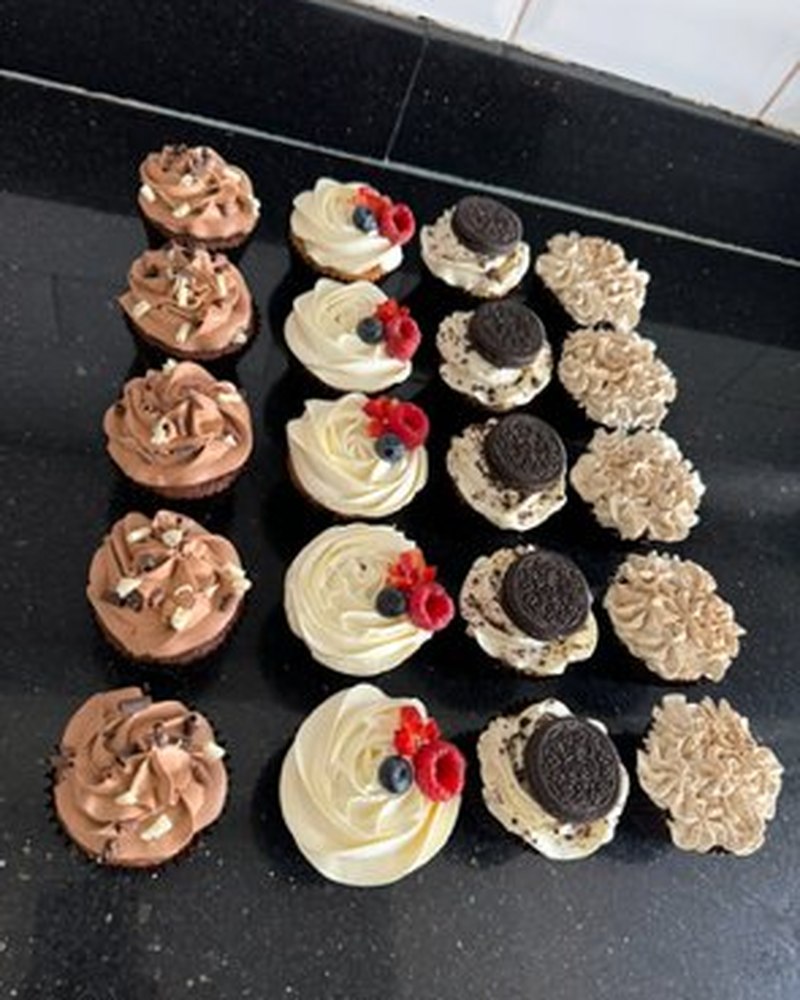 Assorted cupcakes with chocolate, vanilla berry and Oreo toppings